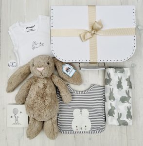 Baby pack with toy bunny bib blanket and card